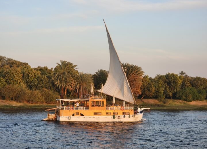 Traditional dahabiya sailboat with lateen sails on the Nile River, Egypt