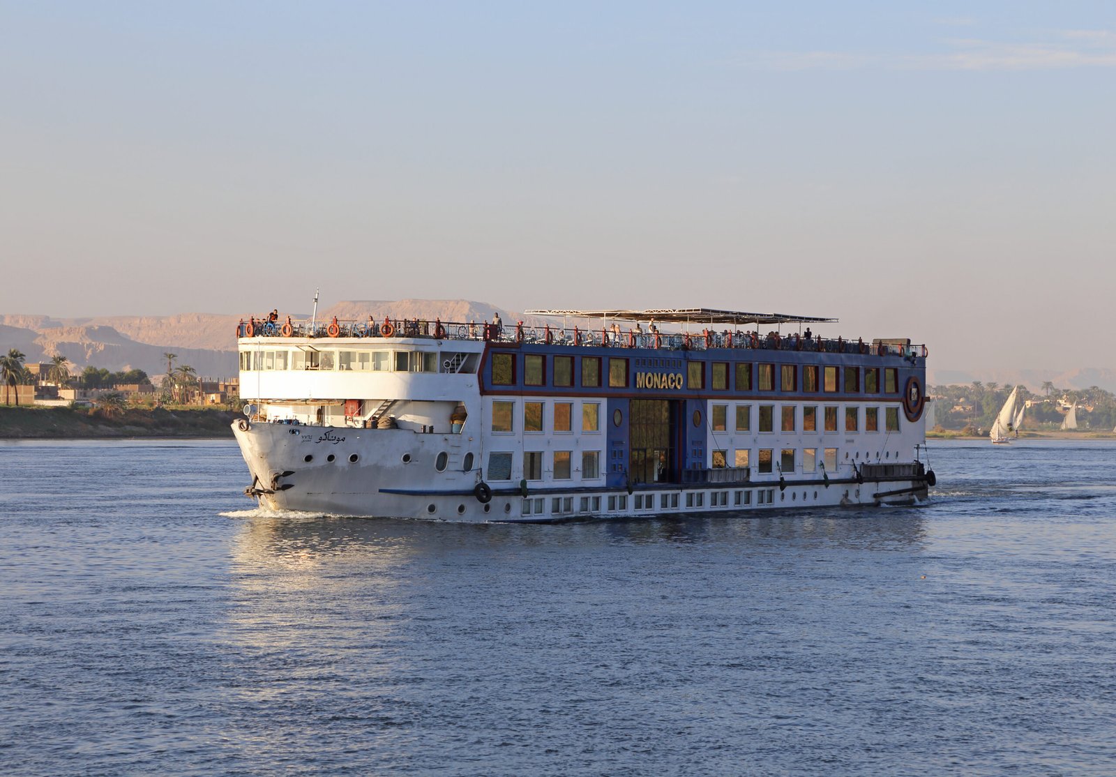 Nile river cruise ship sailing near Luxor, Egypt